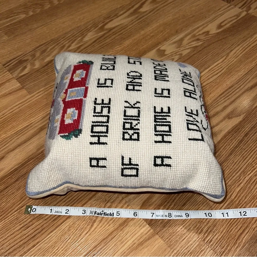 Velvet backed Needlepoint Pillow A House is Built of Brick and Stone‎